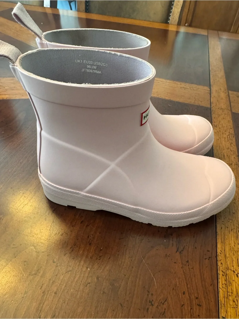 Hunter Kids Light Pink Rain Boots with Logo - size UK1 US2